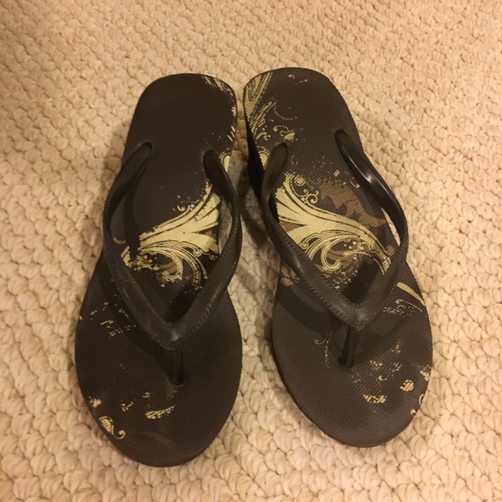 Brown wedge flip flops
